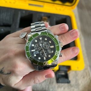 Invicta green accents